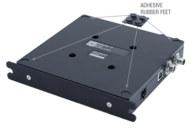 To apply the feet, peel each from the protective backing and place them firmly in the corner recesses on the underside of the unit.