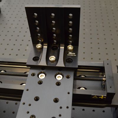 For additional axes at 90 degrees to the AP204 part 2, add an angle bracket such as the AB151 (recommended for linear stages) or the AB90M (for other devices). Use the provided M6 mounting screws and a 5 mm hex key to attach the brackets.