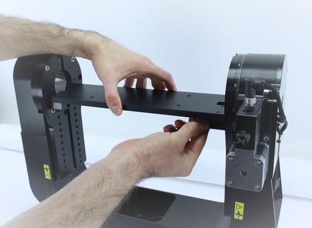 ...with one hand while supporting the plate with the other hand.