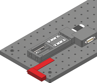 Using the included machinist's square, align the X-axis stage to an edge of the breadboard or other reference edge.