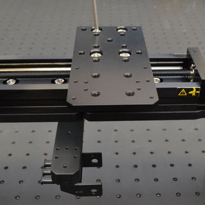 Install AP204 part 2 onto the top of the Y axis LSQ stage using four M6 x 20 mm screws and the 4 mm hex key. Align the stage top and AP204 part 2 edges to each other. Alternate tightening fasteners in a diagonal pattern to snug, then tightly secure.