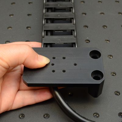 Hold the cable guide up as it will be installed to determine how the adaptors should be oriented.