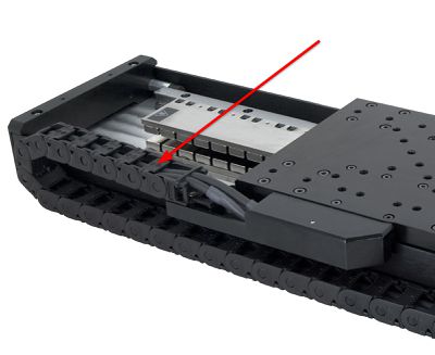 Do not grab the chain with the intent to move, reposition, or lift the stage.