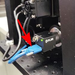 Connect the camera’s power and data cables. Feeding cables in from the back of the MVR can minimize cable clutter.