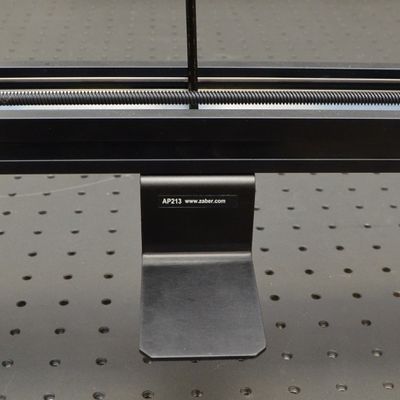 Use two M6 screws and a 4 mm hex key to fasten the AP213 cable guide support(s) to the Y-axis stage.