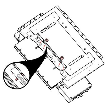 1. Place the X-ADR-AE upside down and align it such that you can see the M6 mounting holes on the top plate through the aperture. Align pins on the red spacer with the outer M6 screw holes.