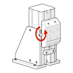 While supporting any load such as an MKR microscope core and associated module attached to the mounting block, loosen the clamp knob.