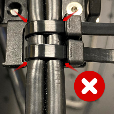 The cable ties in this image have been overtightened and are pinching the cable jacket. Remove ties and start again if needed.