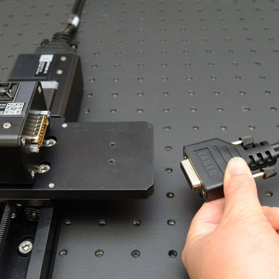 Remove power to the controller, then remove the connector to the Y-axis stage (if connected).