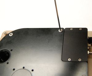 Remove the X-FWR housing lid using a 2.5mm hex key to remove the four cover screws.