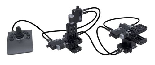 Two XYZ systems with one joystick