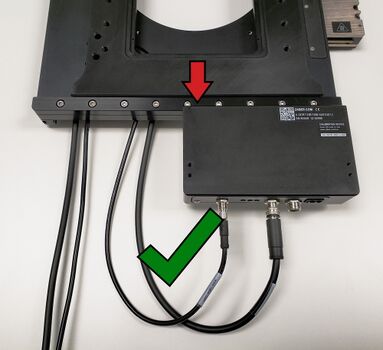 Here is an example of cables with a suitable amount of slack. An adequate bend radius is maintained at both limits of travel.