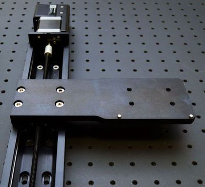 Loosely mount AP200 part 2 on the X-axis 2 stage (connected to controller axis 2) using a 4 mm hex key and four of the provided M6 low profile screws. This plate will be tightened and aligned later.