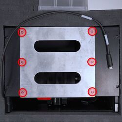 Remove the 6 screws securing the shipping handle to the ASR mounting plates.