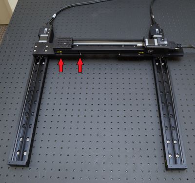 To align the X-axis stages, move the X-axis 2 stage back and forth along its axis (loosen X-axis stage mounting screws if needed), until the AP200 part 2 (the smaller AP200 plate) can be aligned to the Y-axis stage with both dowels touching the edge simultaneously. Do not move the X-axis carriages during this step - keep them at their home positions. Align the stages only by moving the entire stage.