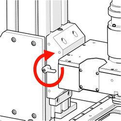 Rotate the clamp knob clockwise to tighten the MKR mounting block clamp.