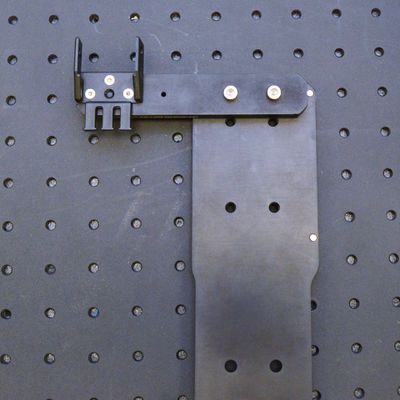 If you are not using AB208 angle brackets, install the AP204 part 1 to the bottom of the AP200 part 1 before you install it to the X axis stages. Use two M5 x 16 mm screws (with M6 threaded holes as through-holes) and the 4 mm hex key to fasten the part to the AP200 as shown. Attach the CGxxT termination (CG01T shown) with two bores as shown using three of the provided M3 flathead screws and the 2 mm hex key. Complete the remaining assembly after Assembly of AP200 Crossmembers and Lockstep Setup.