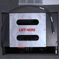 Use the shipping handle to lift the MVR frame out of the case.