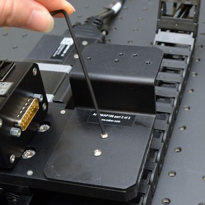 Attach the AP199 part 2 to the AP200 part 1 using two M3 button cap screws and the 2 mm hex key.