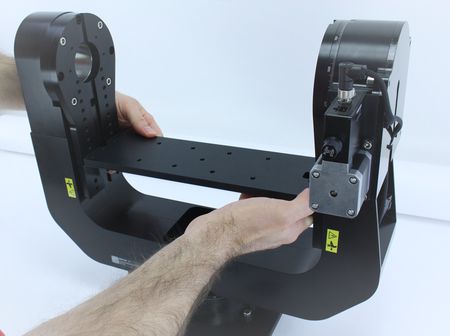 Cautiously, slide the plate with feet down to the desired position. Ensure you keep the plate level as you lower it to avoid any binding.