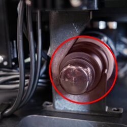 Remove the dust cap off the camera C-Mount threads