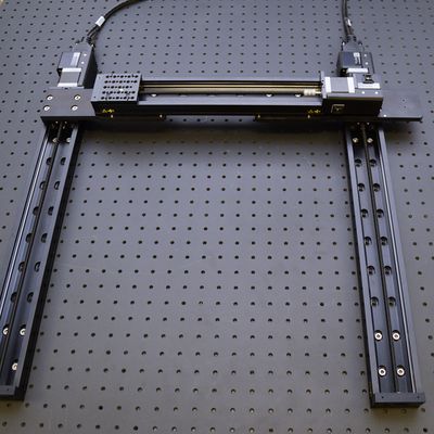 Place the Y-axis stage on top of the two AP200 plates (or against the connected AB208 brackets, if applicable), with the connector end closest to the X-axis 1 stage (controller axis 1), on the larger of the two plates.