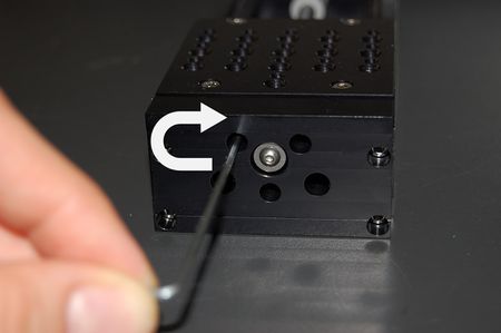 4. Move the stage to its maximum position and tighten the three lead nut screws (0.7 Nm) through the end plate. This realigns the lead nut with the lead screw where it is constrained at the thrust bearing.