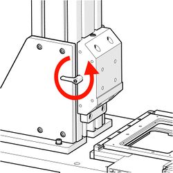 Rotate the clamp lever counterclockwise to loosen the mounting block clamp.