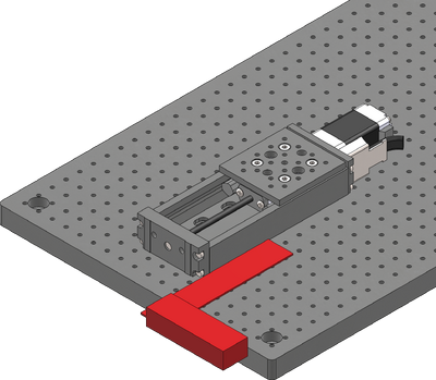 Using the included machinist's square, align the X-axis stage to an edge of the breadboard or other reference edge.
