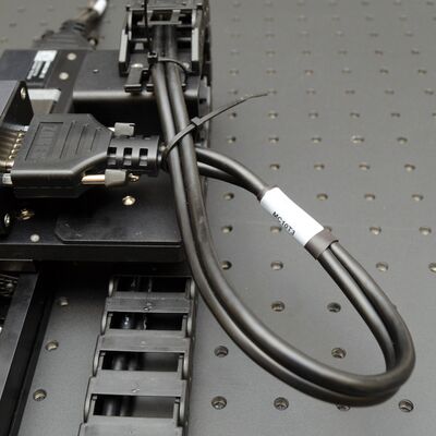 Create the loop of cable using at least 150 to 200 mm (6-8 inches) of cable, for each cable as it exits the guide.