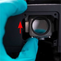 Push up, then forward until the filter “clicks” into place. Repeat for each additional filter cube. Replace the filter cube turret door.